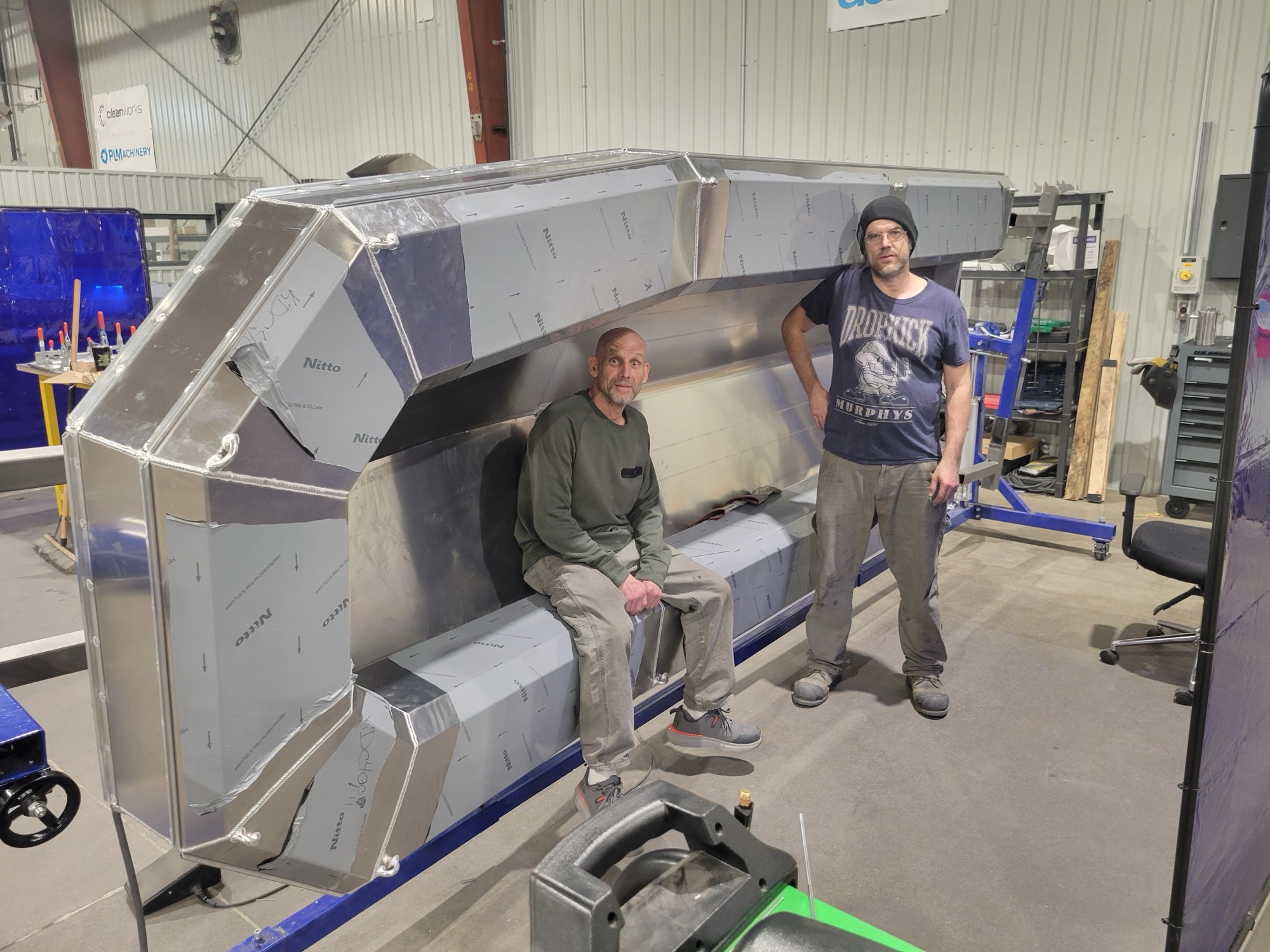 PLM team assembling a large stainless fabrication in the shop