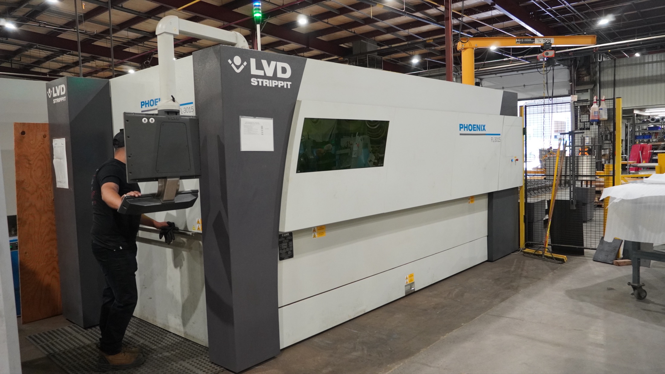 Laser cutting machine on the Pure Life Machinery shop floor