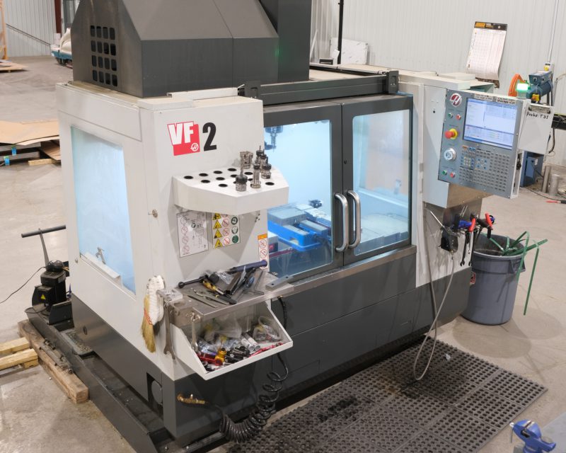 Vertical machining center producing precision parts