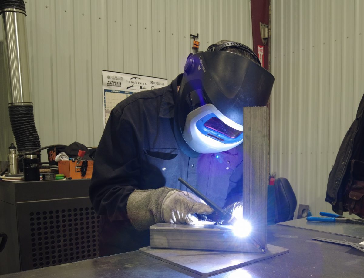 Welder building equipment at Pure Life Machinery